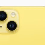 The dual-camera system is shown on the back of a yellow iPhone.  